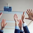 Hands of colleagues
